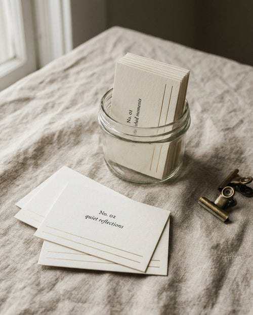 52 reasons cards in a glass jar